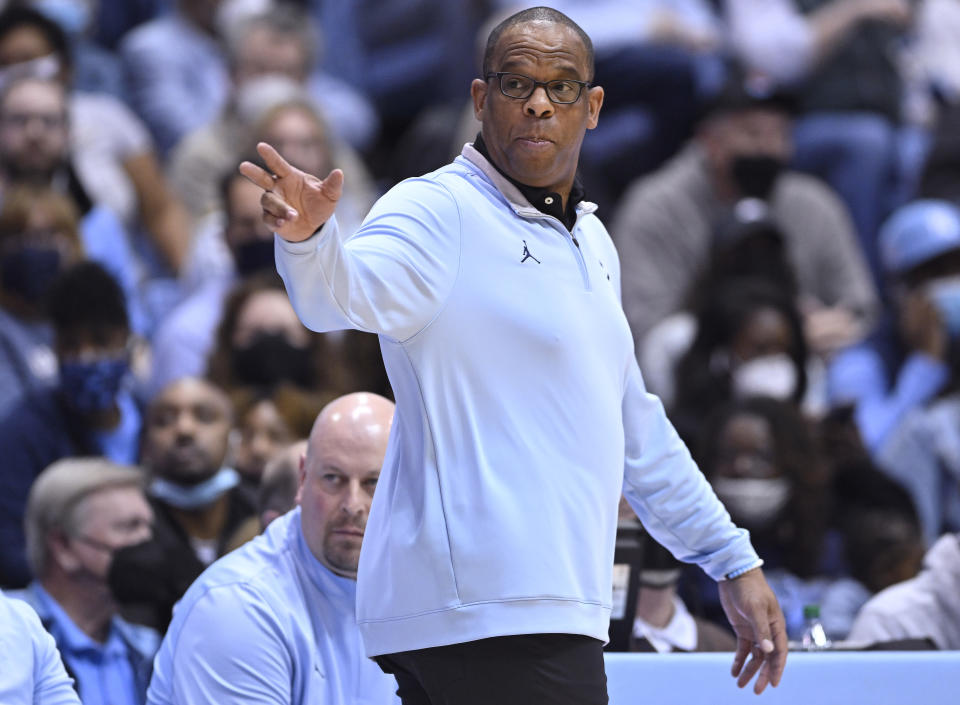 CHAPEL HILL, NORTH CAROLINA - FEBRUARY 21: Head coach Hubert Davis of the North Carolina Tar Heels directs his team against the Louisville Cardinals during the first half of their game at the Dean E. Smith Center on February 21, 2022 in Chapel Hill, North Carolina. (Photo by Grant Halverson/Getty Images)