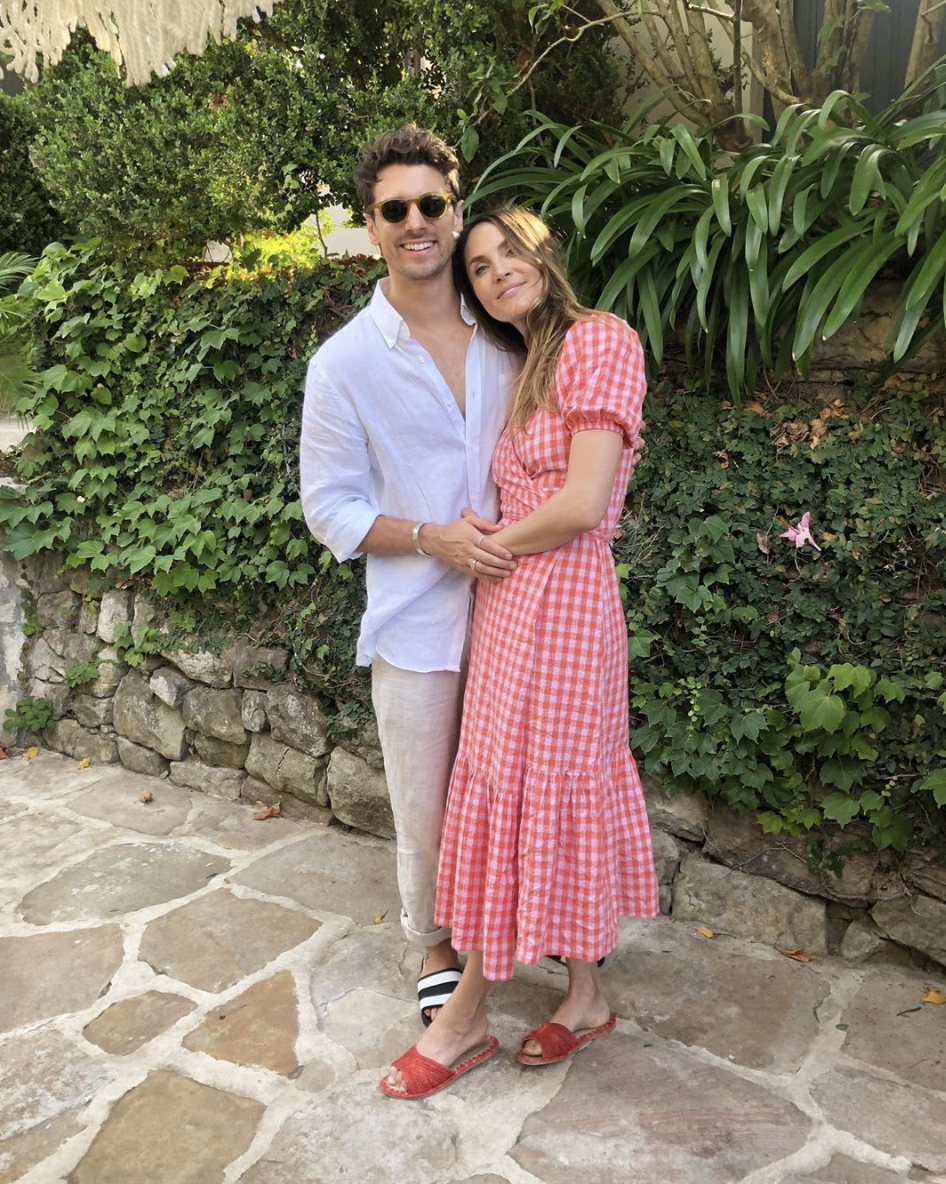 Bachelor star Laura Byrne wearing a red gingham dress pictured with fiancé Matty Johnson