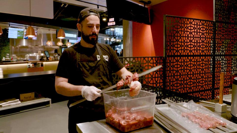 Armen Martirosyan at Mini Kabob's second location in the Topanga Social food hall at the Westfield Topanga Mall.