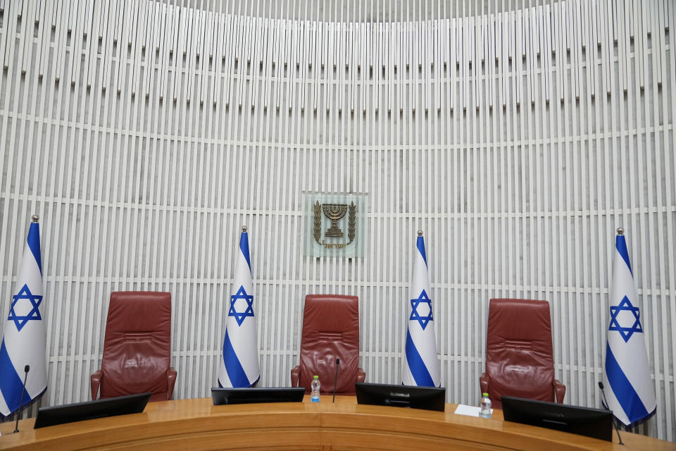 The justices' bench in the Supreme Court of Israel, is seen ahead of a hearing on a petition against a law that limits removal of a prime minister from office to medical and mental incapacitation, which makes forcing Prime Minister Benjamin Netanyahu from office over a conflict of interest while on trial for corruption more difficult, in Jerusalem, Thursday, Aug. 3, 2023. (AP Photo/Ohad Zwigenberg)