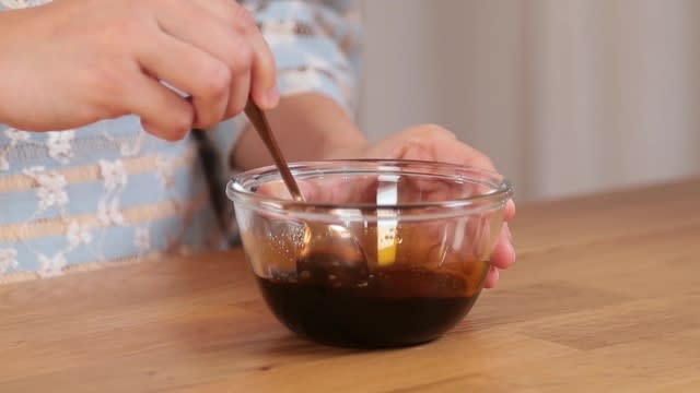 Mixing seasoning sauce in a bowl