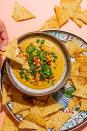 <p>The infinitely versatile cashew does it again with this "cheesy" <a href="https://www.delish.com/cooking/g1992/tex-mex/" rel="nofollow noopener" target="_blank" data-ylk="slk:Tex-Mex dip;elm:context_link;itc:0;sec:content-canvas" class="link ">Tex-Mex dip</a> that's hard to distinguish from the <a href="https://www.delish.com/cooking/recipe-ideas/a25647686/queso-dip-recipe/" rel="nofollow noopener" target="_blank" data-ylk="slk:original;elm:context_link;itc:0;sec:content-canvas" class="link ">original</a>. Make it yours: Swap the chipotle with your favorite salsa, a can of Ro-tel, or harissa for a slightly different flavor profile.<br></p><p>Get the <strong><a href="https://www.delish.com/cooking/recipe-ideas/a36816841/vegan-queso-recipe/" rel="nofollow noopener" target="_blank" data-ylk="slk:Chipotle Vegan Queso recipe;elm:context_link;itc:0;sec:content-canvas" class="link ">Chipotle Vegan Queso recipe</a></strong>.</p>