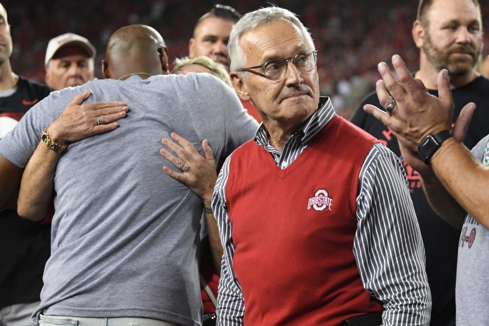 Former Ohio State head coach Jim Tressel watches a scoreboard tribute for the 2002 national championship team during the second quarter of a Buckeyes' game against Notre Dame, Saturday, Sept. 3, 2022, in Columbus.