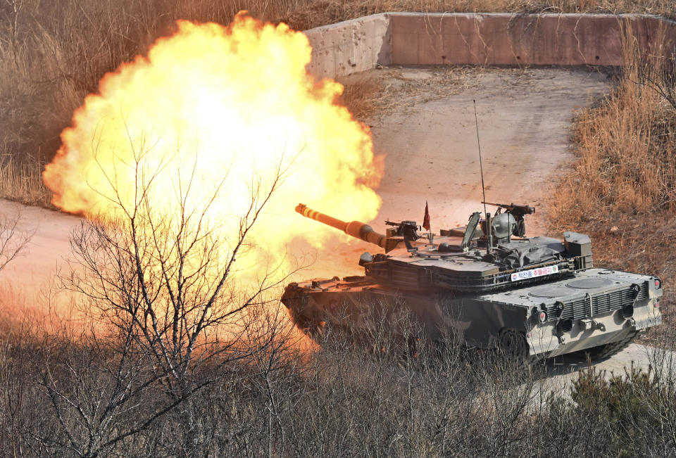 A South Korean K1A2 tank fires during a joint live fire exercise at a military training field in Pocheon Thursday, March 14, 2024, as part of the annual Freedom Shield joint military exercise between South Korea and the United States. (Jung Yeon-je /Pool Photo via AP)