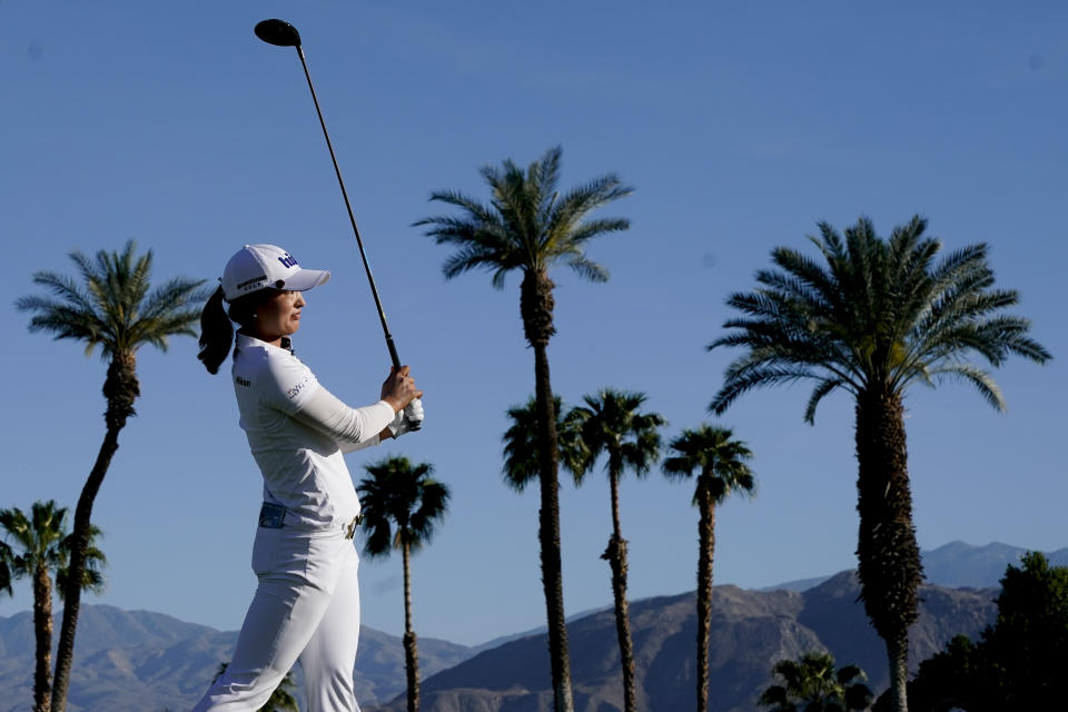 Jin Young Ko, of South Korea, watches her tee shot on the 16th hole during the third round of the LPGA Tour ANA Inspiration golf tournament at Mission Hills Country Club, Saturday, April 6, 2019, in Rancho Mirage, Calif. (AP Photo/Chris Carlson)
