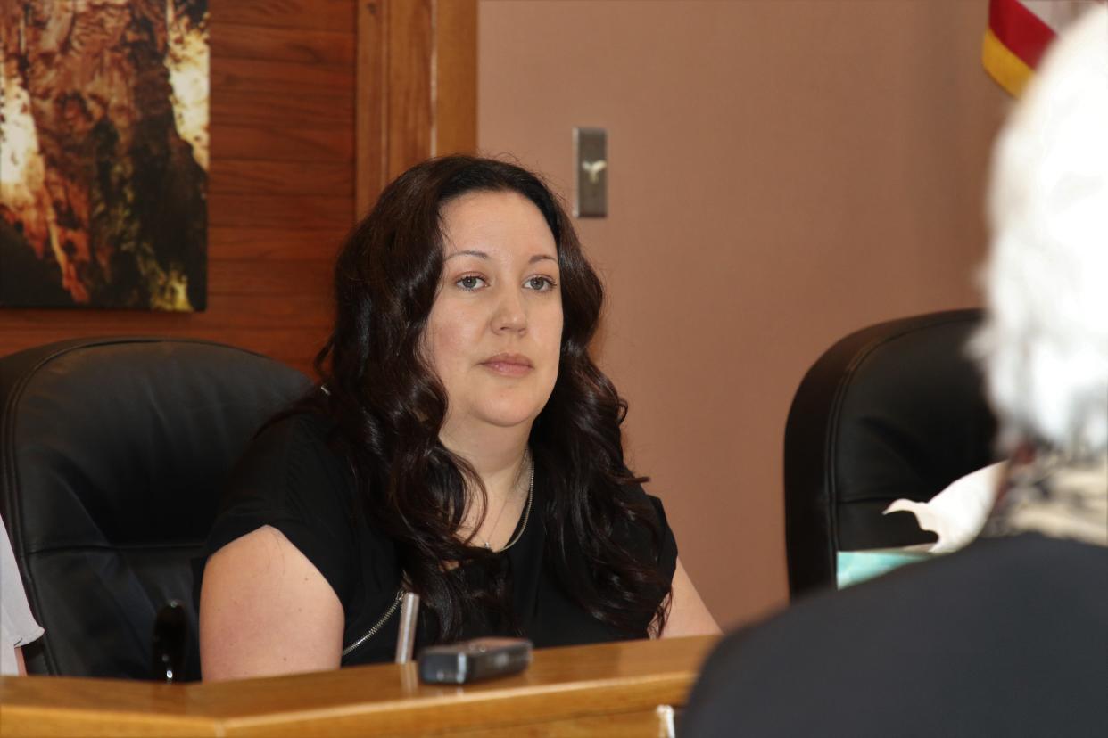 Eddy County Manager Roberta Gonzales listens to a presentation from State Rep. Cathrynn Brown (R-55) during an April 18, 2023 meeting of the Eddy County Board of County Commissioners.