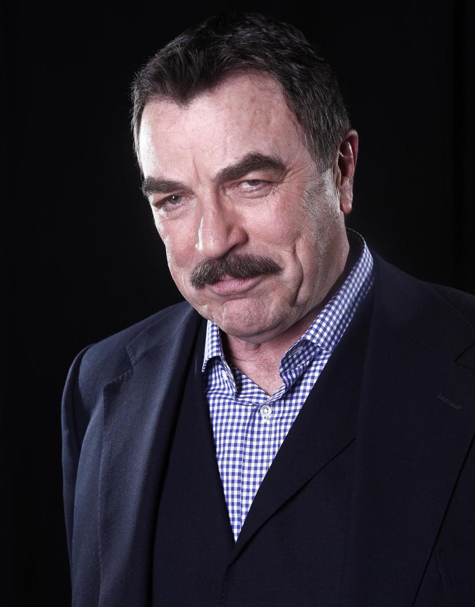 In this March 21, 2012 photo, actor Tom Selleck poses for a portrait in New York. On the CBS hit drama, "Blue Bloods," Selleck plays Frank Reagan, the NYPD Commissioner as well as the patriarch of a family devoted to law enforcement and one another. Selleck is also starring in "Jesse Stone: Benefit of the Doubt," airing on CBS on May 20. It's the eighth in the series of Jesse Stone TV whodunits that began in 2005, based on characters created by the late Robert B. Parker in his best-selling series of books. (AP Photo/Carlo Allegri)