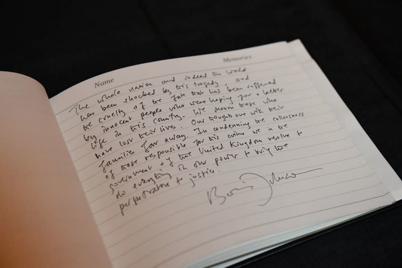 General view of a message left by Britain's Prime Minister Boris Johnson in the book of condolence at Thurrock Council Offices in Grays