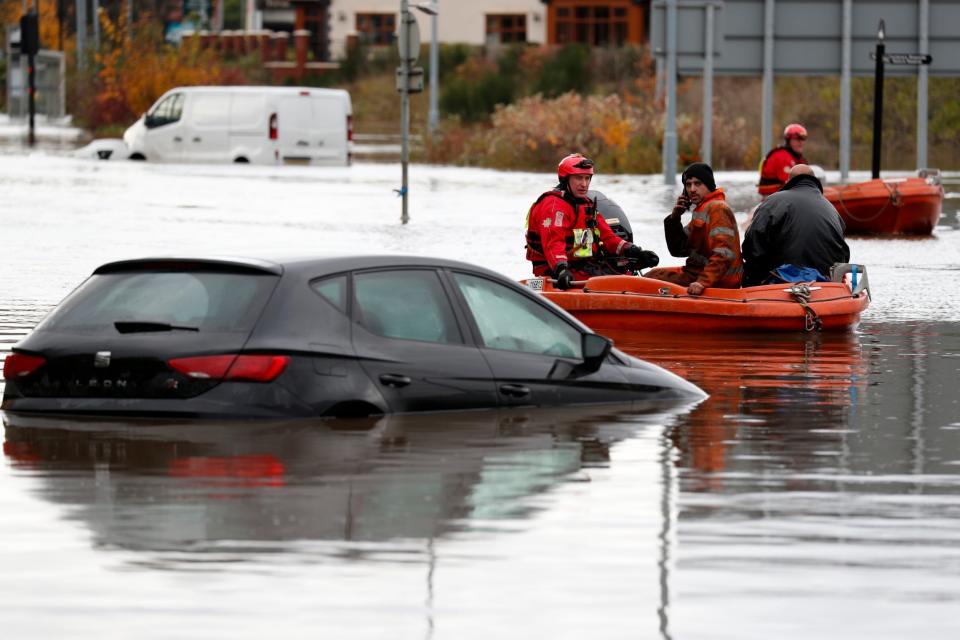 Rescue operations tried to get waterlocked residents to areas of safety (Getty Images)