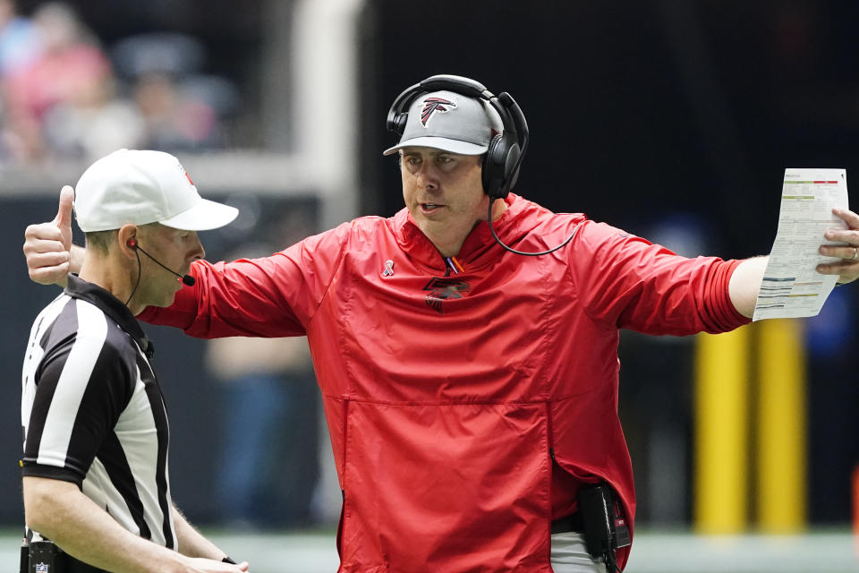 Atlanta Falcons head coach Arthur Smith speaks to an official during the first half of an NFL football game against the Philadelphia Eagles, Sunday, Sept. 12, 2021, in Atlanta. (AP Photo/John Bazemore)