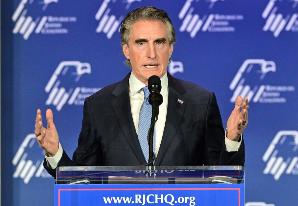 US Republican presidential candidate Doug Burgum addresses the Republican Jewish Coalition (RJC) Annual Leadership Summmit on October 28, 2023 at the Venetian Conference Center in Las Vegas, Nevada.