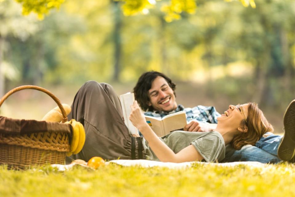 Having a picnic is a great way to enjoy the outdoors with your partner. Getty Images