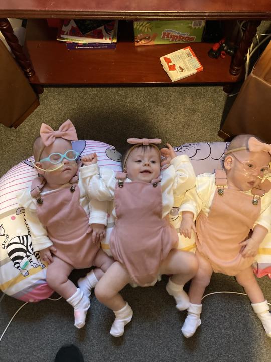 Rubi-Rose (far right), Payton Jane (middle) and Porscha-Mae (far left) spent 216 days in a neonatal intensive care unit (Guinness World Records)
