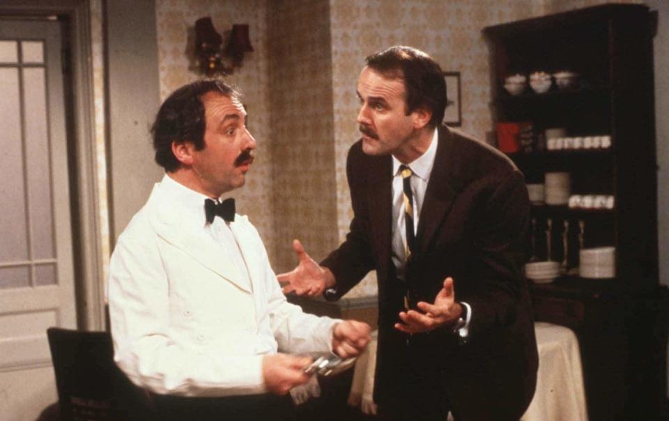 Andrew Sachs as Manuel (left) and John Cleese as Basil - PA Photo/BBC
