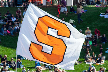 Oct 18, 2014; Winston-Salem, NC, USA; A Syracuse Orange flag is ran across the field after a score during the third quarter against the Wake Forest Demon Deacons at BB&T Field. Syracuse defeated Wake Forest 30-7. (Jeremy Brevard-USA TODAY Sports)