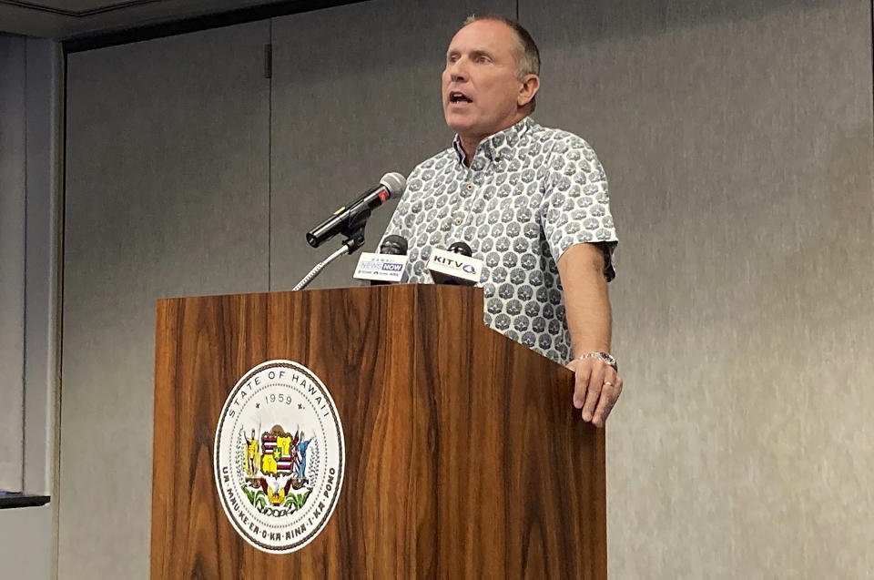 Jon Snook, chief operating officer of Hawaiian Airlines, speaks at a news conference at Daniel K. Inouye International Airport in Honolulu on Sunday, Dec. 18, 2022. According to a Hawaii emergency response agency, nearly a dozen people were seriously injured when a Hawaiian Airlines flight to Hawaii was rocked by severe turbulence on Sunday about 30 minutes outside Honolulu. (AP Photo/Audrey McAvoy)