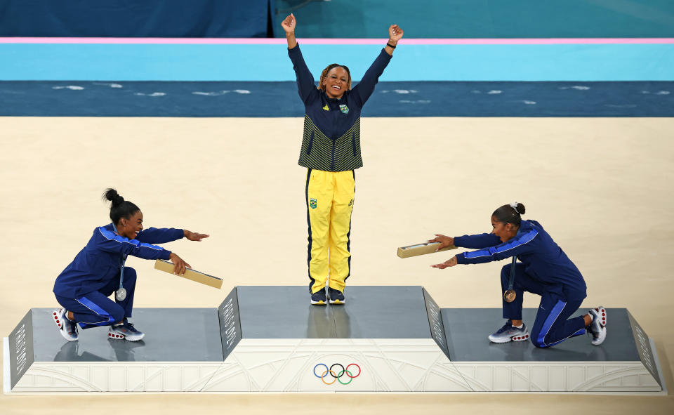 Biles, Andrade and Chiles stood together on the first ever all-Black gymnastics podium. (Elsa/Getty Images)