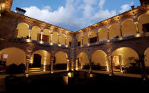 <p>One of the first Spanish constructions in Cusco, Peru, the 16th-century mansion that now houses <a rel="nofollow noopener" href="http://www.inkaterra.com/inkaterra/la-casona/" target="_blank" data-ylk="slk:Inkaterra La Casona;elm:context_link;itc:0;sec:content-canvas" class="link ">Inkaterra La Casona</a> is actually a national monument. Originally inhabited by the first conquistadors and their descendants, the 11-suite home has maintained much of its original design and architecture—like colonial furniture and original murals—while adding modern comforts (think heated floors, oversized bathtubs, and down duvets).</p>