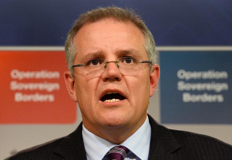 Australian Immigration Minister Scott Morrison speaks during a press conference in Sydney on September 30, 2013