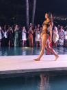 <p><em>SI </em>cover star Danielle Herrington hits the runway in a black mesh bikini for the 2018 <em>Sports Illustrated</em> swimsuit show during Miami Swim Week at the W South Beach hotel on July 15. (Photo: Julie Tong) </p>