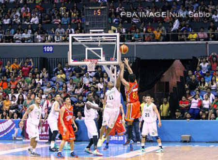 Sunday Salvacion's game-winning triple which banked off the glass and gave Meralco a thrilling 90-89 win. (Photo by Nuki Sabio/PBA Images)