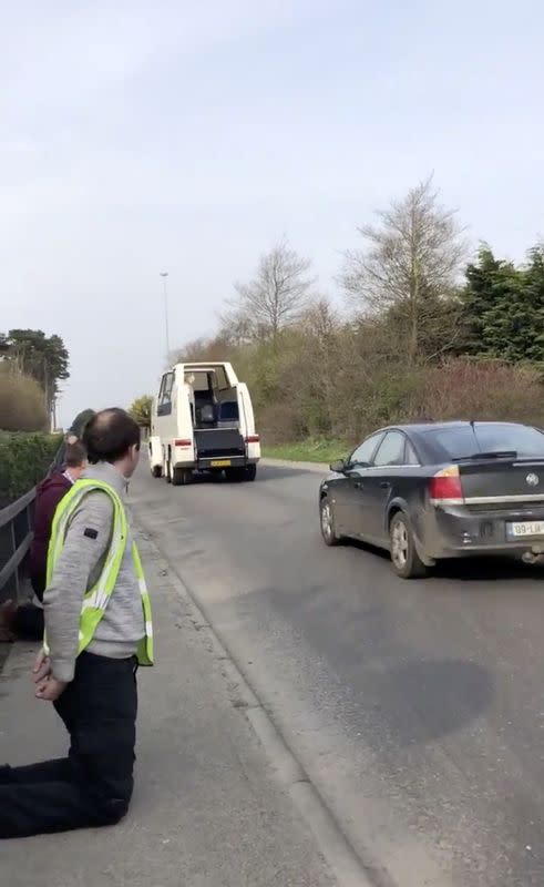 Irish priest spreads coronavirus Easter cheer from vintage 'popemobile'