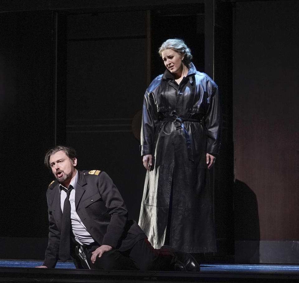 In this image provided by the Met Opera, soprano Lise Davidsen as Leonora and baritone Igor Golovatenko as her brother, Carlo, in a new production of Verdi's "La Forza del Destino" opening Feb. 26, 2024, at the Metropolitan Opera. in New York. (Karen Almond/Met Opera via AP)