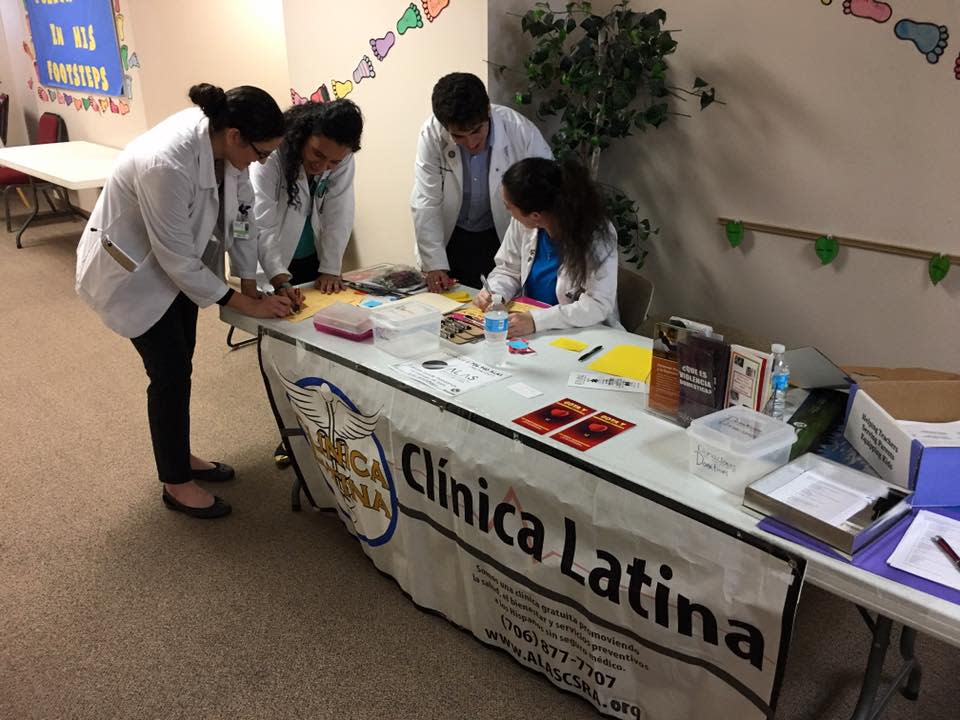 Volunteers staff the Clinica Latina table during a Community Health Fair put on by the Asociación Latina de Servicios del CSRA. The event returns May 7, 2022.