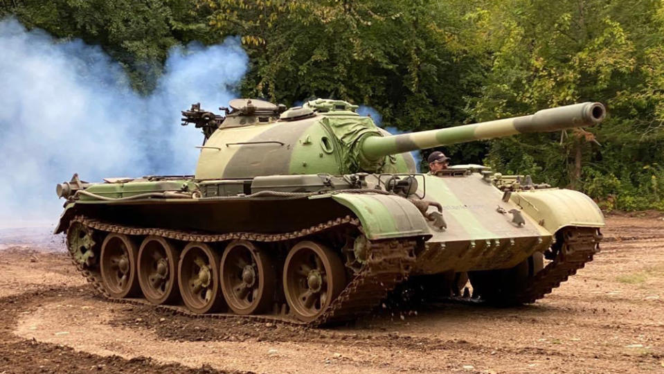 Piloting a Russin T-54 tank at Drive a Tank in Kasota, Minn.