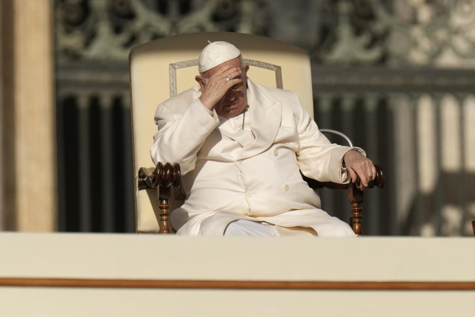 Pope Francis sits as he holds his weekly general audience in St. Peter's Square, at the Vatican, Wednesday, March 29, 2023. (AP Photo/Alessandra Tarantino)