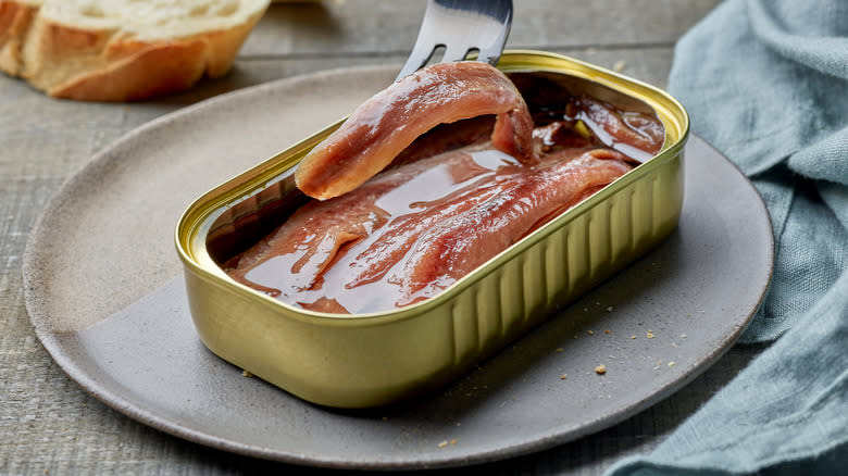 tinned anchovies on a plate