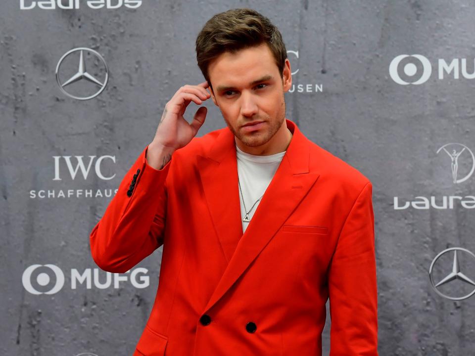 Liam Payne red suit