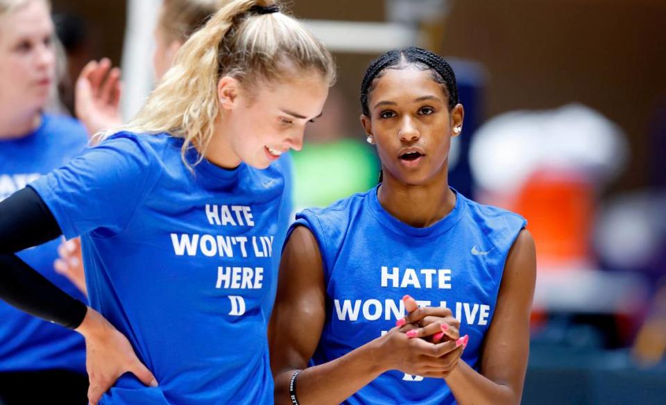 Duke’s Rachel Richardson, right, talks with Gracie Johnson during warmups before the Blue Devils’ game against East Tennessee State University in the Duke Invitational at Cameron Indoor Stadium in Durham, N.C., Friday, Sept. 2, 2022. Ethan Hyman/ehyman@newsobserver.com