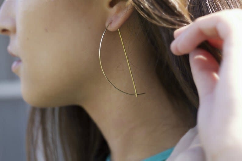 <strong><a href="https://fave.co/2YJKEqD" target="_blank" rel="noopener noreferrer">Find these earrings starting at $24 from the Laos Born shop on Etsy</a></strong>.