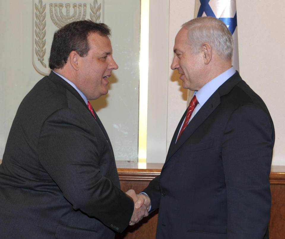 In this photo released by the Israeli Government Press Office, Israeli Prime Minister Benjamin Netanyahu, right, shakes hands with New Jersey Gov. Chris Christie, left, during a meeting in Jerusalem, Monday, April 2, 2012. Christie kicked off his first official overseas trip to the Middle East Monday, meeting Israeli leaders in what may boost the rising Republican star's foreign policy credentials ahead of November's presidential elections. (AP Photo/ GPO, Moshe Milner) ISRAEL OUT