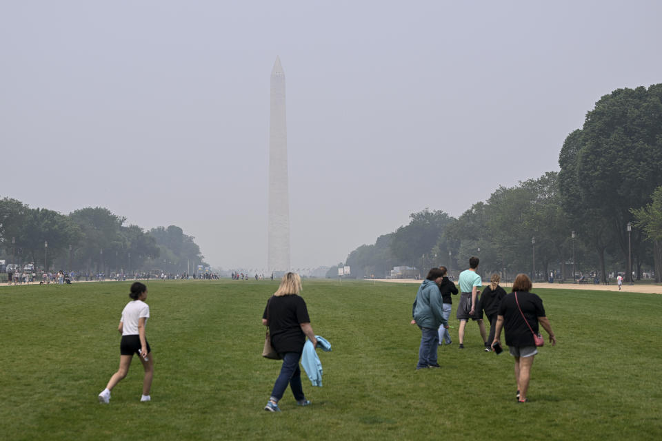 <p>WASHINGTON D.C., UNITED STATES - JUNE 08: A view of the smoke covered Washington Monument as air quality fell to dangerous levels due to Canada's wildfires, according to reports from the National Weather Service, in Washington DC, United States on June 08, 2023. Changed the air quality level from orange to red in and around Washington DC. (Photo by Celal Gunes/Anadolu Agency via Getty Images)</p> 