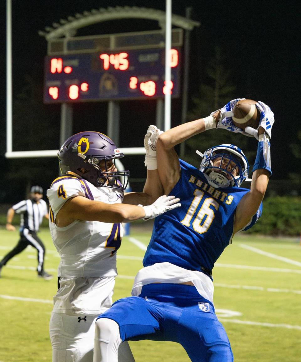 Ripon Christian’s Jace Beidleman makes a catch along the sideline as Orestimba’s Nathan Archuleta defends during the Southern League game in Ripon, Calif., Friday, Sept. 22, 2023.