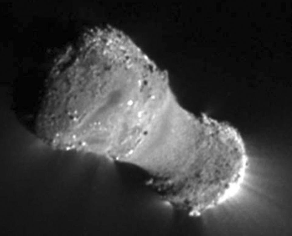 This photo provided by the journal Science and taken in autumn 2010 by NASA's Deep Impact spacecraft shows a close-up picture of the hyperactive comet, Hartley 2, that seems to be spewing water. Hartley 2 isn't the only such comet, but it's the first to be visited by a spacecraft during a flyby, researchers report in the Friday, June 17, 2011, edition of the journal Science. (AP Photo/NASA via Science)