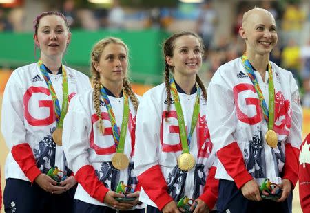 2016 Rio Olympics - Cycling Track - Victory Ceremony - Women's Team Pursuit Victory Ceremony - Rio Olympic Velodrome - Rio de Janeiro, Brazil - 13/08/2016. Kate Archibald (GBR) of Britain, Laura Trott (GBR) of Britain, Elinor Barker (GBR) of Britain and Joanna Rowsell (GBR) of Britain with the gold medals. REUTERS/Eric Gaillard