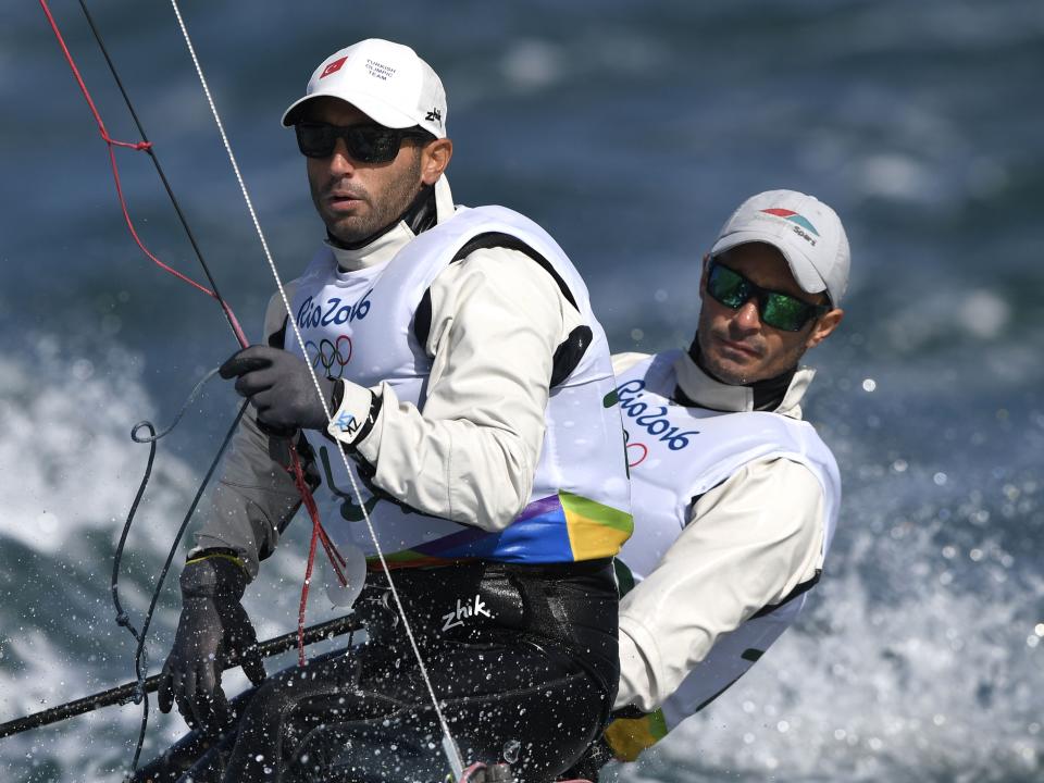 Ates and Deniz Cinar on a sailboat at the 2016 Olympics