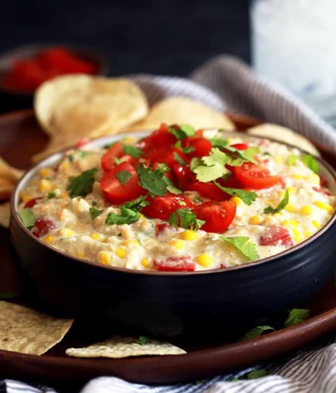 <p>Melanie Makes</p><p>Don't let the simpleness of this dip fool you-it will disappear over and over.<br></p><p><strong>Get the recipe: <a href="https://melaniemakes.com/slow-cooker-salsa-verde-corn-dip/" rel="nofollow noopener" target="_blank" data-ylk="slk:Slow Cooker Salsa Verde Corn Dip;elm:context_link;itc:0;sec:content-canvas" class="link ">Slow Cooker Salsa Verde Corn Dip</a></strong></p>