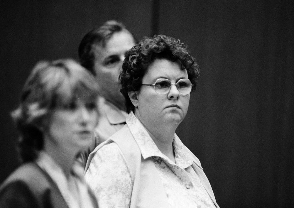 Carol Bundy standing for trial