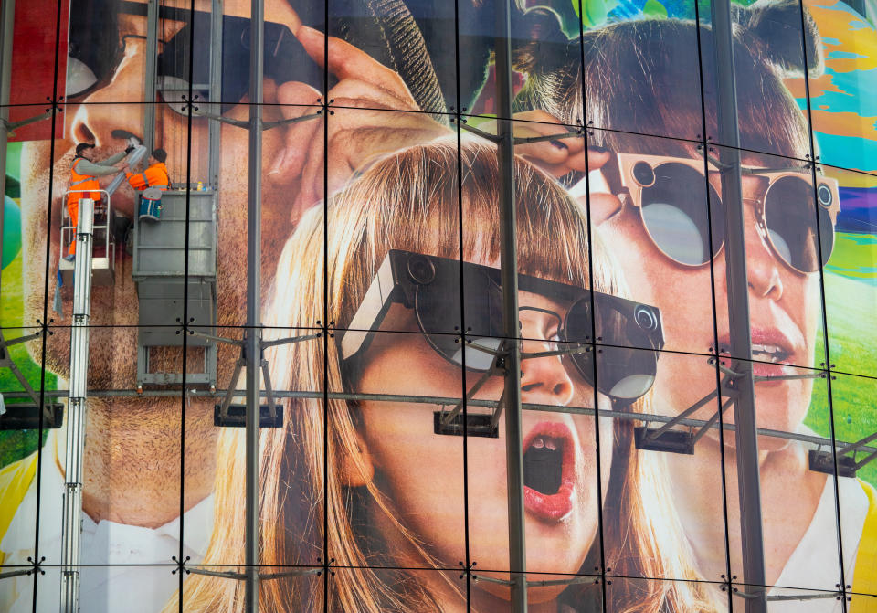 Workers change the large scale billboard advert on the outside of the BFI Imax cinema in Waterloo, central London. Picture date: Sunday January 24, 2021. (Photo by Dominic Lipinski/PA Images via Getty Images)