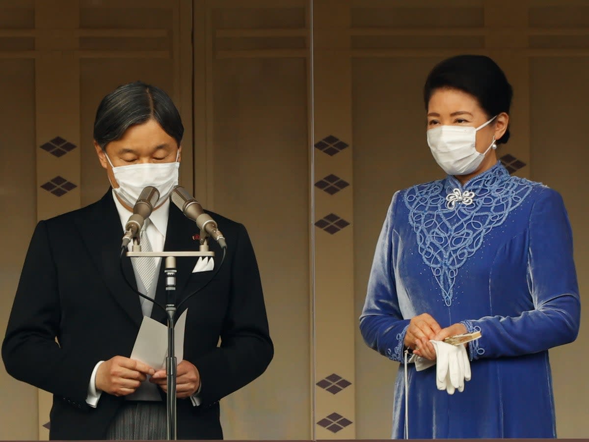 Emperor Naruhito of Japan and his wife Empress Masako greet visitors during his birthday celebration at the Imperial Palace on 23 February 2023 in Tokyo, Japan. The emperor turns 63 this year (Getty Images)