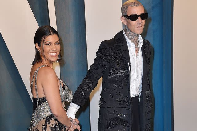 <p>Broadimage/Shutterstock</p> Kourtney Kardashian and Travis Barker in 2022.