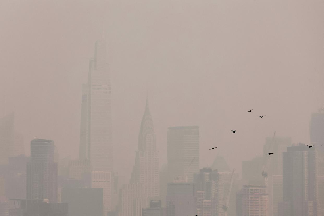 The Manhattan skyline wreathed in smoke from wildfires in Canada on June 7, 2023 (REUTERS)
