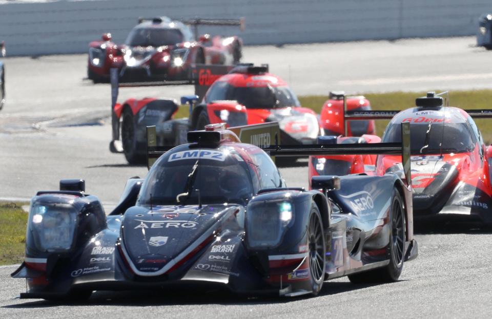 The no. 22 Oreca LMP2 07 is followed closely through the bus stop, Sunday January 23, 2022 during the Weather Tech Championship Rolex 24 qualifying race at Daytona International Speedway.