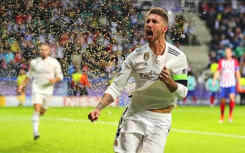 Sergio Ramos celebrates scoring for Real Madrid - Credit: getty images