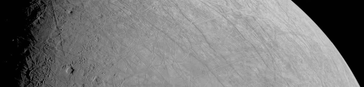 The icy and grooved surface of Jupiter’s moon Europa as seen by Nasa’s Juno probe on 29 September, 2022 (Nasa/JPL)