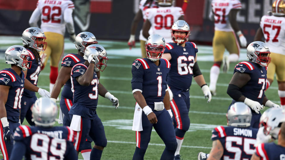 FOXBOROUGH, MA - OCTOBER 25: New England Patriots quarterback Cam Newton (1) looks in the direction of WR Jakobi Myers (16, far left) after a pass intended for Myers in the second quarter was intercepted. The 49ers defensive players run en masse to the end zone to interact with an on field television camera. The New England Patriots host The San Francisco 49ers during a regular season NFL game on Sunday, Oct. 25, 2020 at Gillette Stadium in Foxborough, MA. (Photo by Jim Davis/The Boston Globe via Getty Images)